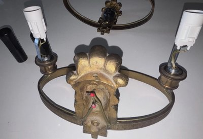 Maison BAGUES, Aux Indiens wall lights in gilded and patinated bronze