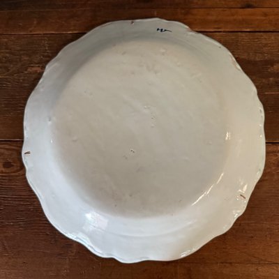 Large dish in Rouen earthenware, polychrome cornucopia 18th century