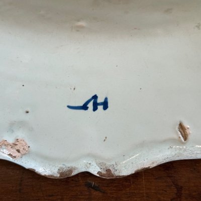 Large dish in Rouen earthenware, polychrome cornucopia 18th century