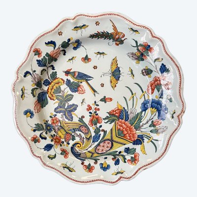 Large dish in Rouen earthenware, polychrome cornucopia 18th century