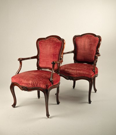 Four walnut armchairs, Venice, mid-18th century