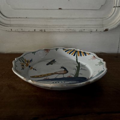 18th century La Rochelle earthenware plate with peacock and butterfly design