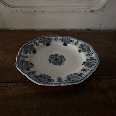 Plate in 18th century Moustiers earthenware with floral design