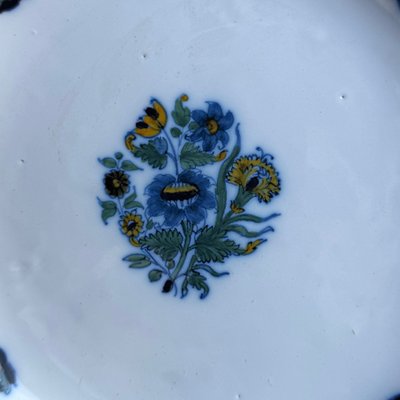 Plate in 18th century Moustiers earthenware with floral design