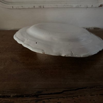 Plate in 18th century Moustiers earthenware with floral design