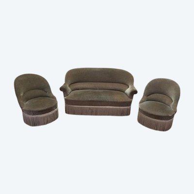 Crapaud Lounge con divano in velluto marrone e poltrone