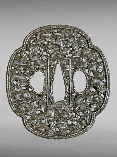 Tsuba mokko gata in ferro traforato e cesellato con decorazione shishi con il suo certificato.NBTHK Hozon