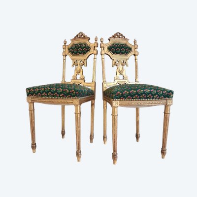 Coppia di sedie in legno dorato stile Luigi XVI XIX