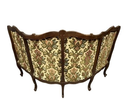 Rare Louis XV style corner bench in carved wood from the 19th century