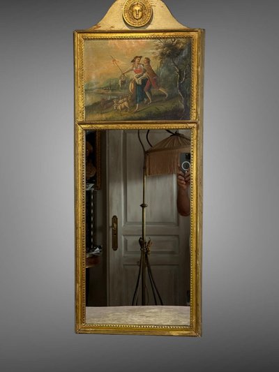 19th CENTURY EMPIRE STYLE LAMQUED AND GILDED WOOD TRUMP WITH A SHEPHERD DECORATIVE