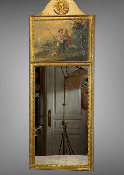 19th CENTURY EMPIRE STYLE LAMQUED AND GILDED WOOD TRUMP WITH A SHEPHERD DECORATIVE