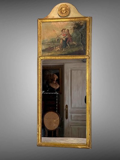 19th CENTURY EMPIRE STYLE LAMQUED AND GILDED WOOD TRUMP WITH A SHEPHERD DECORATIVE