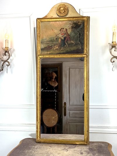 19th CENTURY EMPIRE STYLE LAMQUED AND GILDED WOOD TRUMP WITH A SHEPHERD DECORATIVE