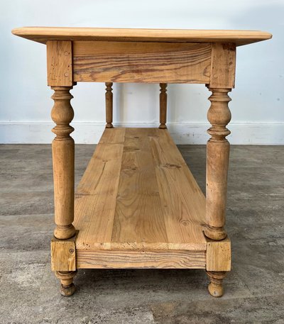 Raw pine draper table