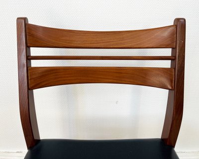 Set of 8 Scandinavian-style chairs in teak and imitation leather from the 50s/60s