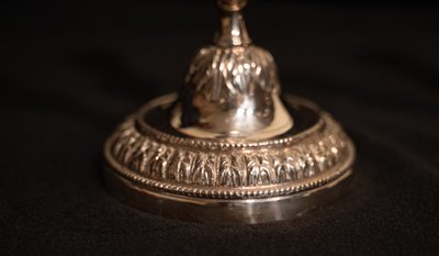 Pair of Louis XVI style silver-plated candlesticks / torches