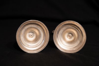 Pair of Louis XVI style silver-plated candlesticks / torches