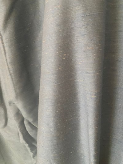 Second pair of sky blue cotton and silk curtains with decorative braces