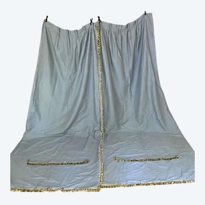 Second pair of sky blue cotton and silk curtains with decorative braces
