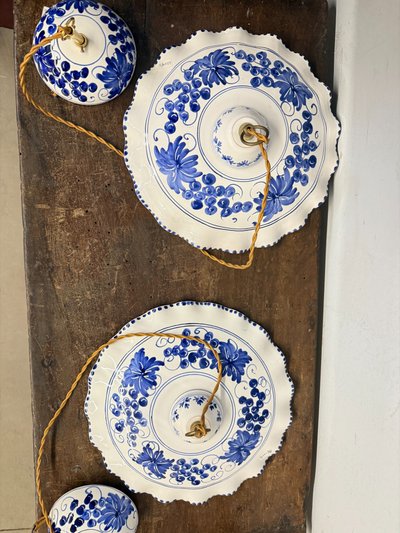 Pair of hand-painted ceramic chandeliers 20th century, 30x7cm