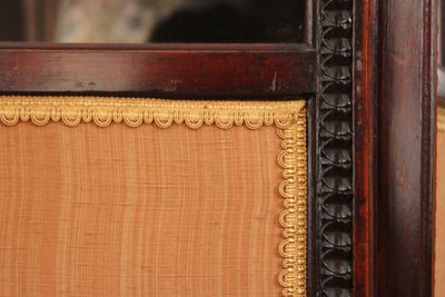 - Louis XVI-style four-leaf folding screen in carved and mahogany-stained beech. Work