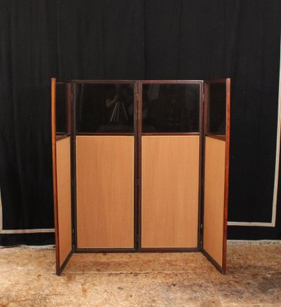 - Louis XVI-style four-leaf folding screen in carved and mahogany-stained beech. Work