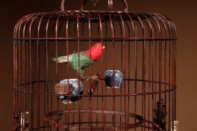 Chinese birdcage in finely carved bamboo.