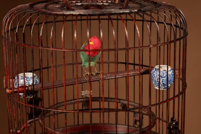 Chinese birdcage in finely carved bamboo.