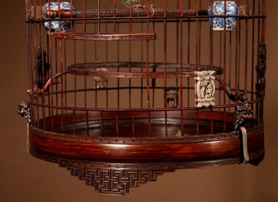 Chinese birdcage in finely carved bamboo.