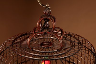 Chinese birdcage in finely carved bamboo.