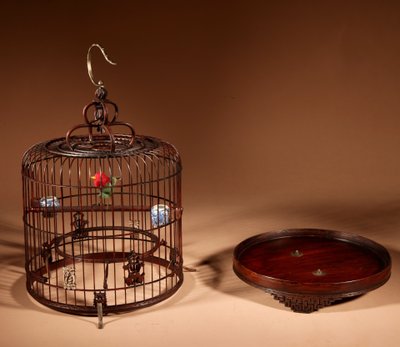 Chinese birdcage in finely carved bamboo.