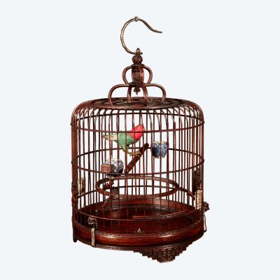 Chinese birdcage in finely carved bamboo.