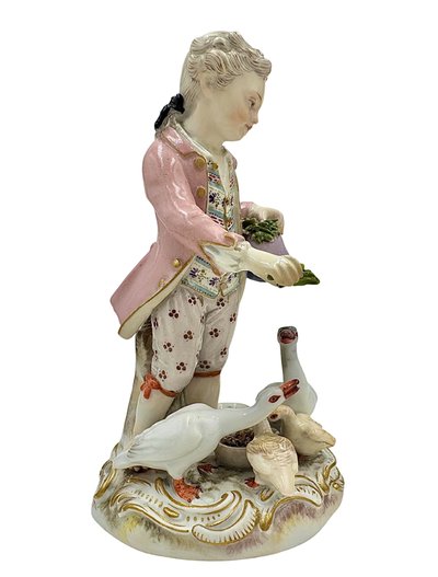 Meissen porcelain figurine Boy feeding geese.