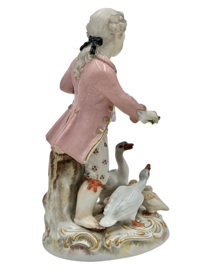 Meissen porcelain figurine Boy feeding geese.