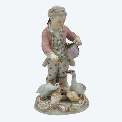 Meissen porcelain figurine Boy feeding geese.