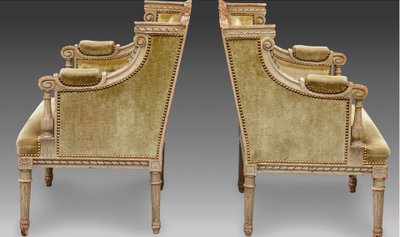 une paire de bergères en bois sculpté, peint gris vert, fin XIXème siècle 