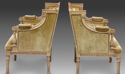 une paire de bergères en bois sculpté, peint gris vert, fin XIXème siècle 