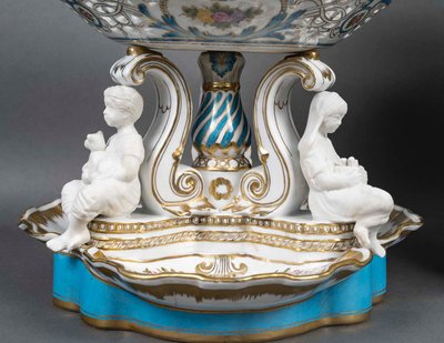 An important pair of porcelain and biscuit centerpieces, late 19th century
