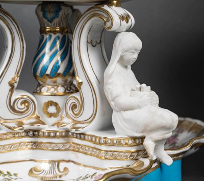 An important pair of porcelain and biscuit centerpieces, late 19th century