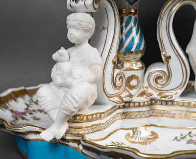 An important pair of porcelain and biscuit centerpieces, late 19th century