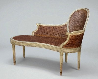 1900S LOUIS XVI STYLE CANED BENCH IN PATINATED WOOD