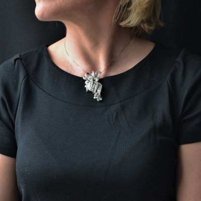 Spilla con diamanti brillanti e baguette