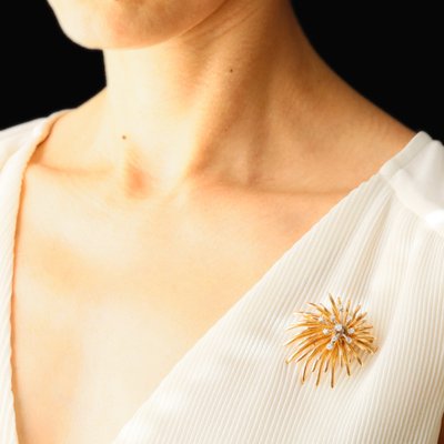 Spilla d'oro vintage con diamanti