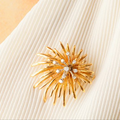 Spilla d'oro vintage con diamanti