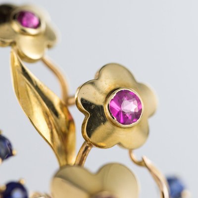 Spilla a bouquet retrò in oro e pietre preziose