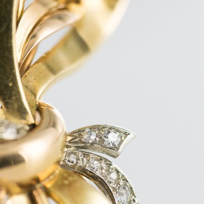 Spilla a bouquet retrò in oro e pietre preziose