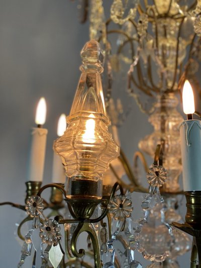 12-light bronze chandelier with pendants Circa 1900