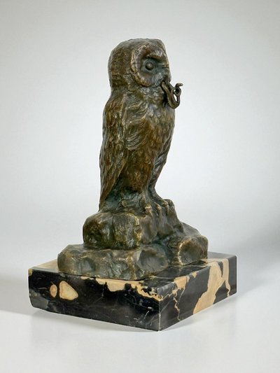 BRONZE WATCH HOLDER SIGNED H.RISCH DEPICTING AN OWL AND ITS SNAKE
