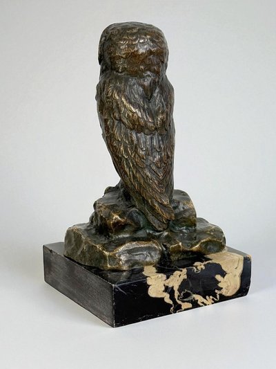 BRONZE WATCH HOLDER SIGNED H.RISCH DEPICTING AN OWL AND ITS SNAKE