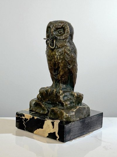 BRONZE WATCH HOLDER SIGNED H.RISCH DEPICTING AN OWL AND ITS SNAKE